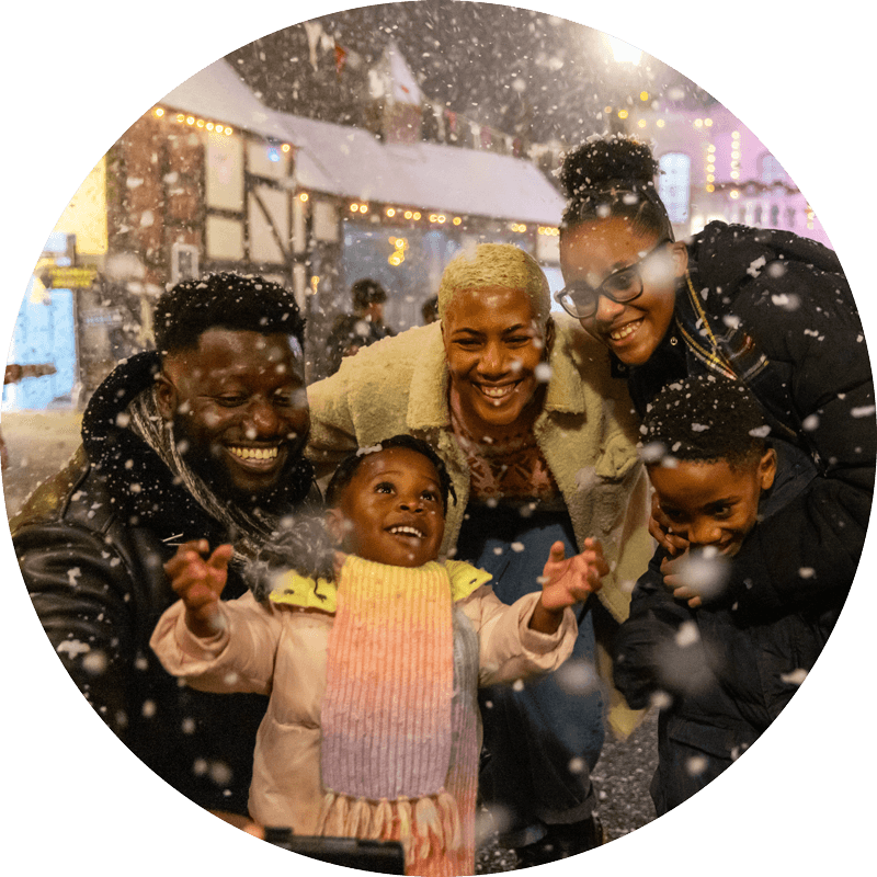 Family in the snow by Knapford Station